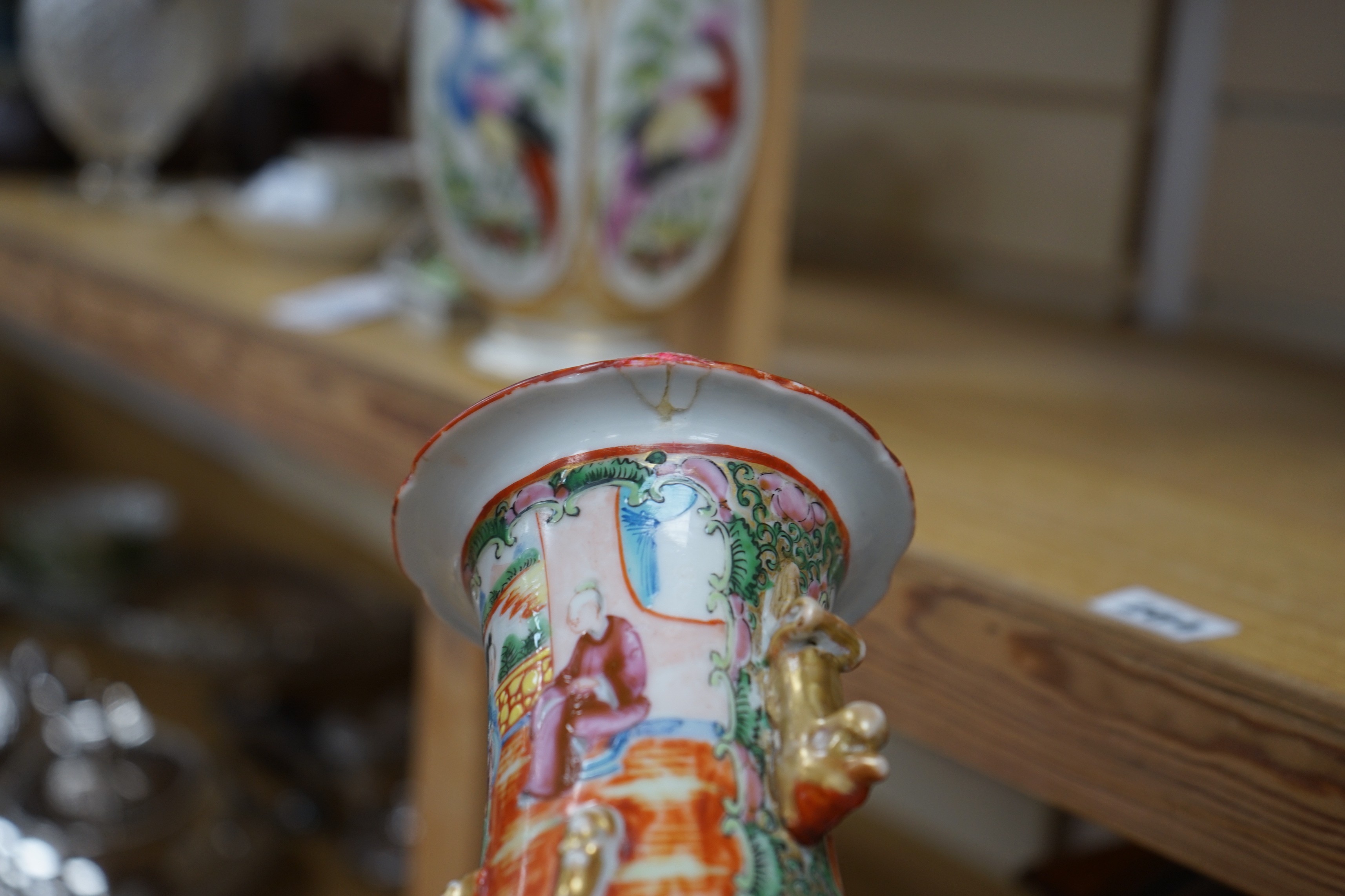 Three Chinese famille rose vases and a teapot, late 19th/early 20th century, tallest vase 29.5 cms high